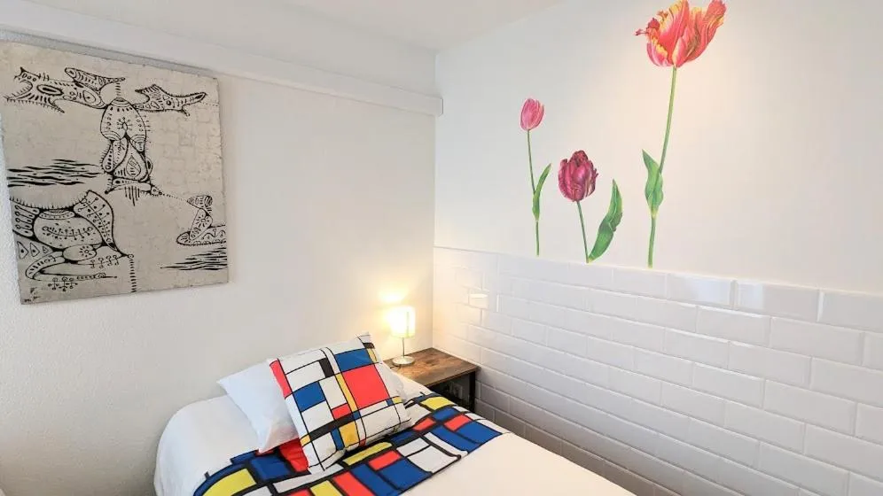 Bed in The Amsterdam Hotel Apartment in the Center