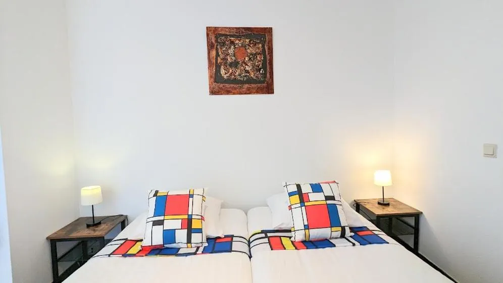 Bed in The Amsterdam Hotel Apartment in the Center