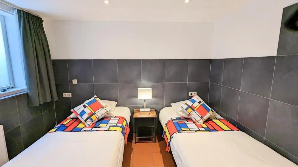 Bed in The Amsterdam Hotel Apartment in the Center