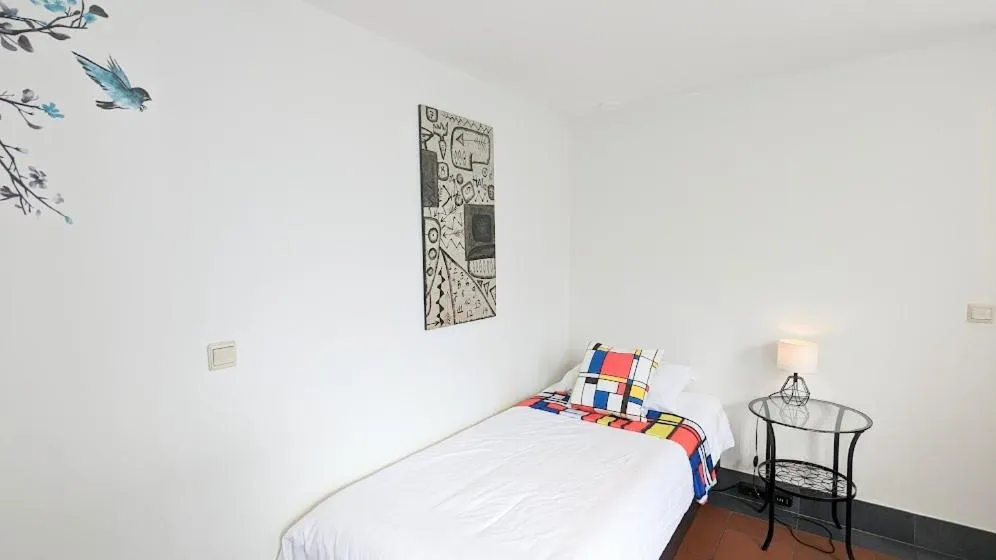 Bed in The Amsterdam Hotel Apartment in the Center