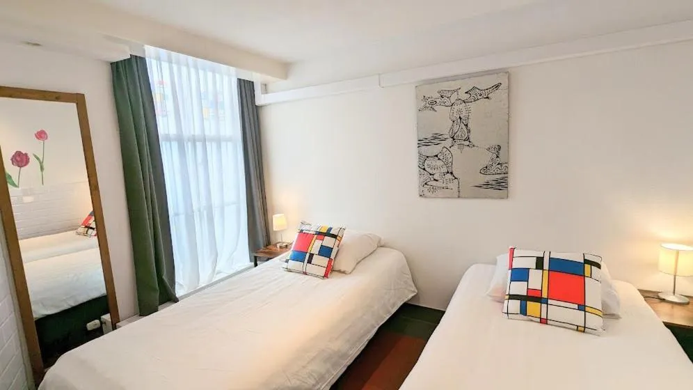 Bed in The Amsterdam Hotel Apartment in the Center