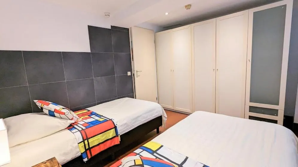 Bed in The Amsterdam Hotel Apartment in the Center