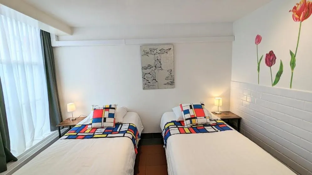 Bed in The Amsterdam Hotel Apartment in the Center