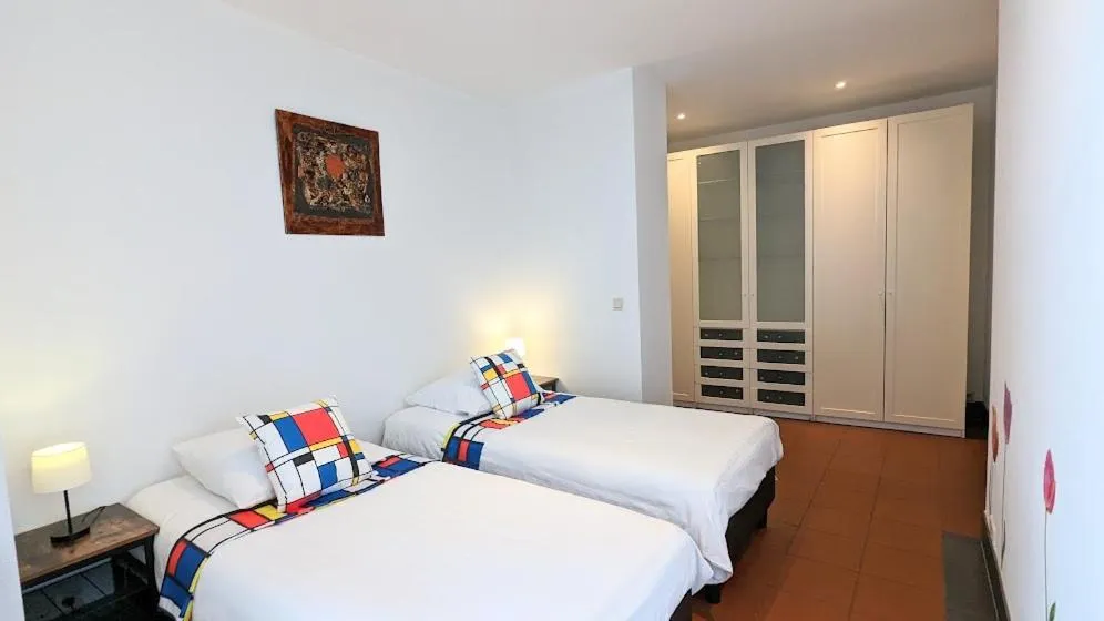 Bed in The Amsterdam Hotel Apartment in the Center