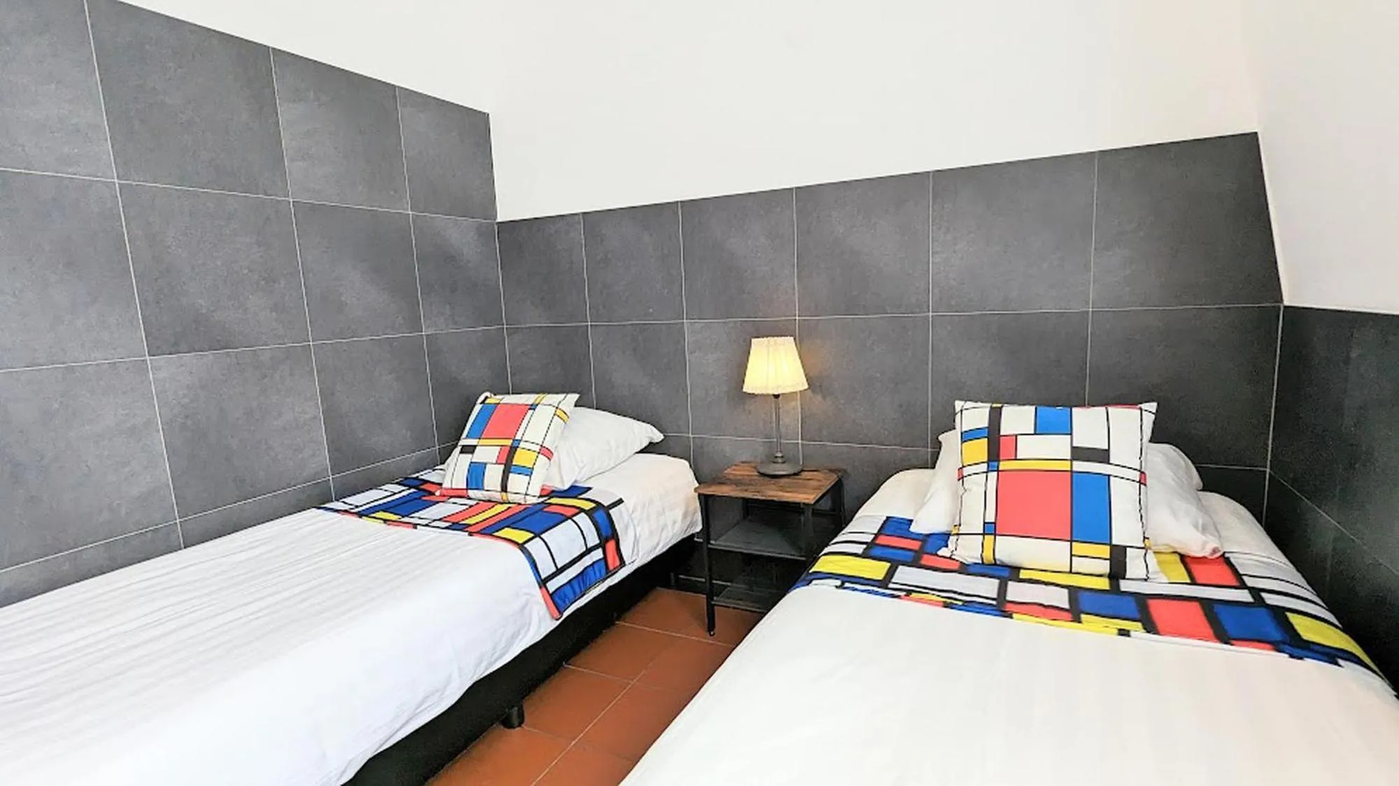 Bed in The Amsterdam Hotel Apartment in the Center