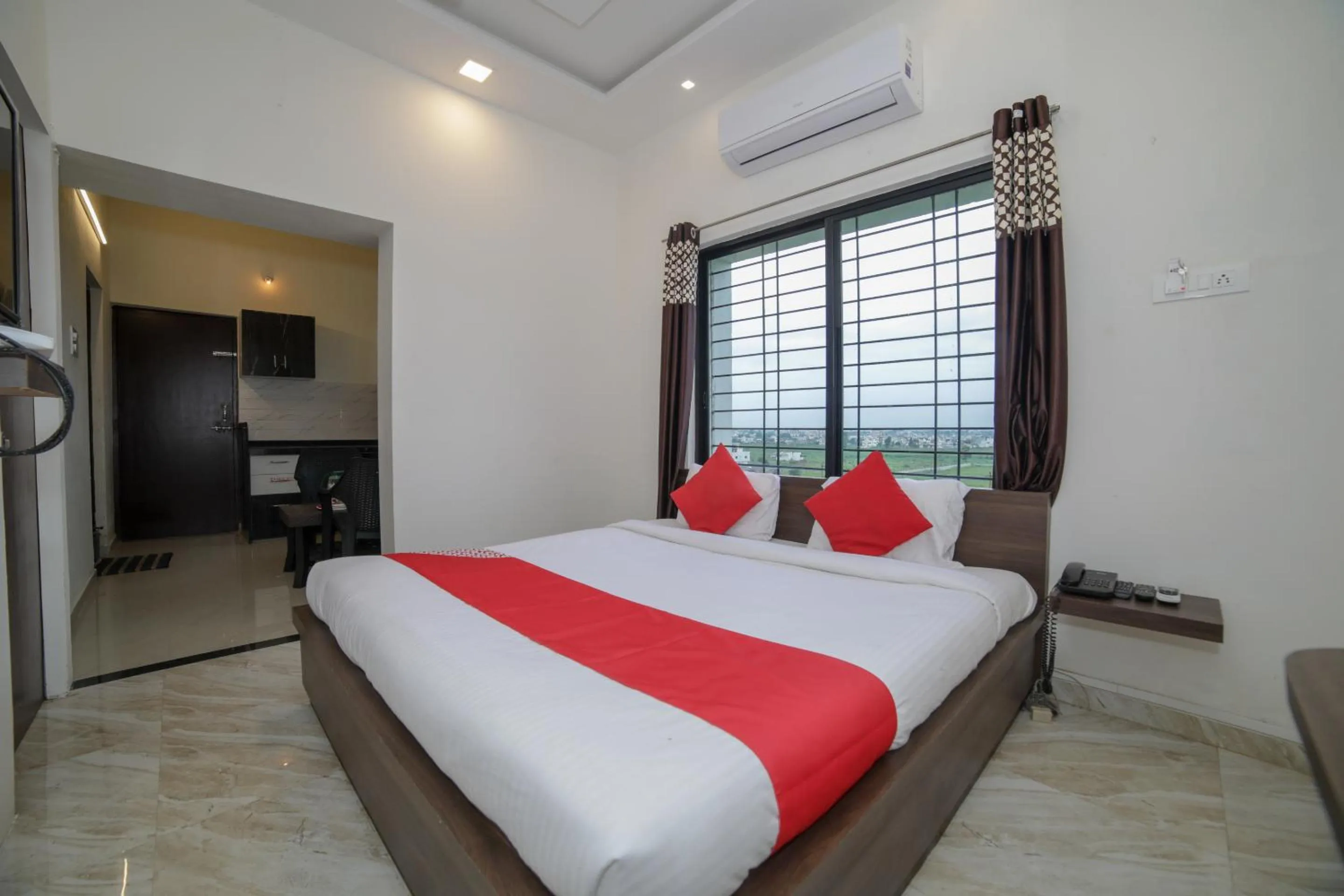 Bed in Hotel O Seva Service Apartment