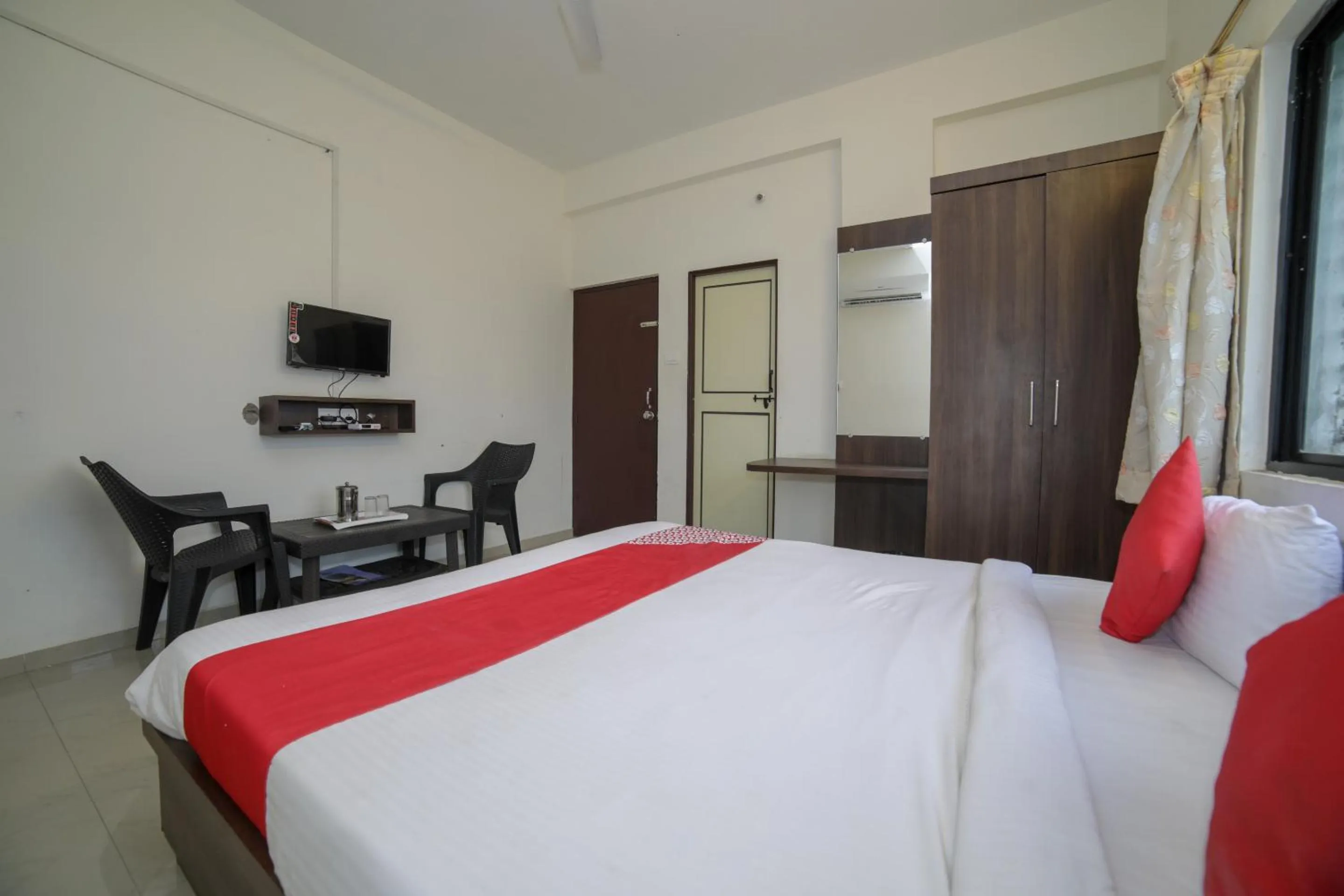 Bed in Hotel O Seva Service Apartment