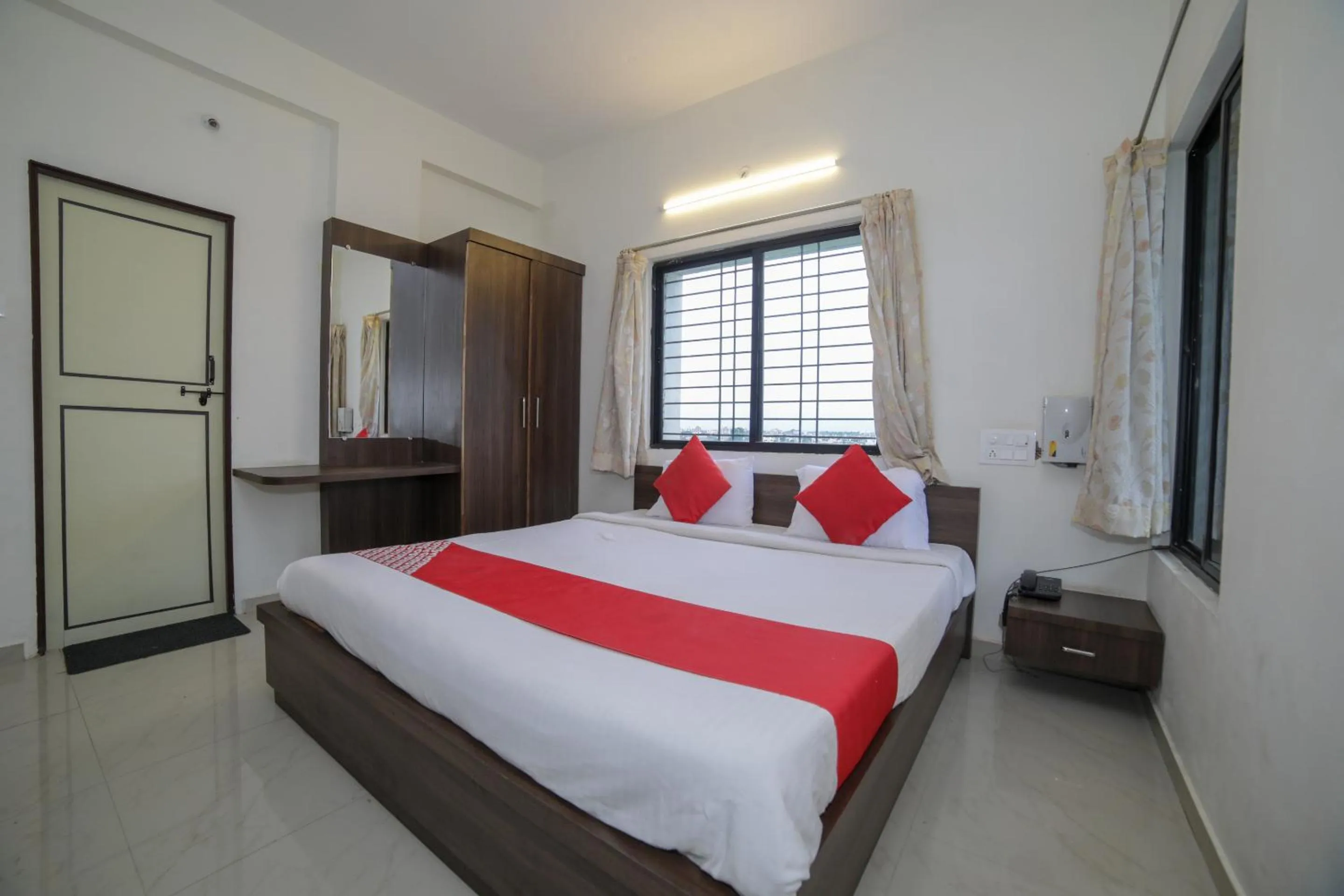 Bed in Hotel O Seva Service Apartment