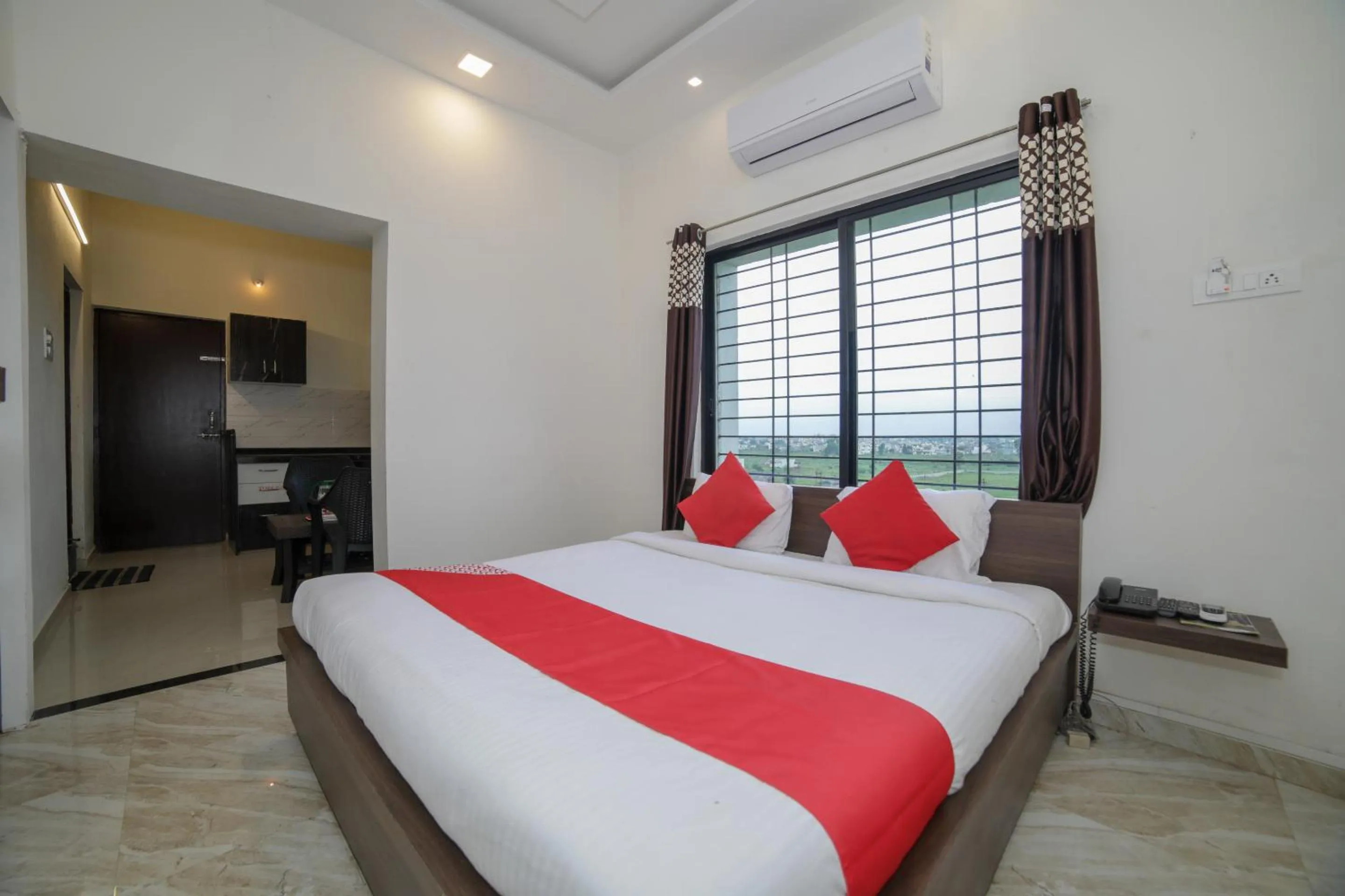 Bed in Hotel O Seva Service Apartment