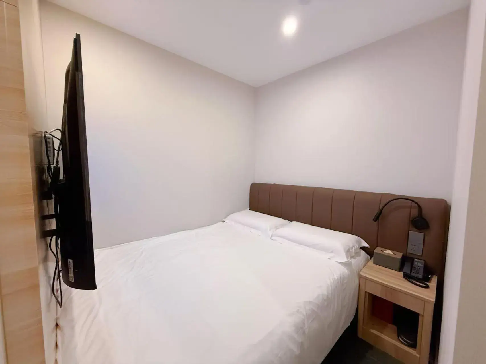 Bed in Hanting Hotel Beijing Wudaokou Tsinghua Park Bed in Hanting Hotel Beijing Wudaokou Tsinghua Park