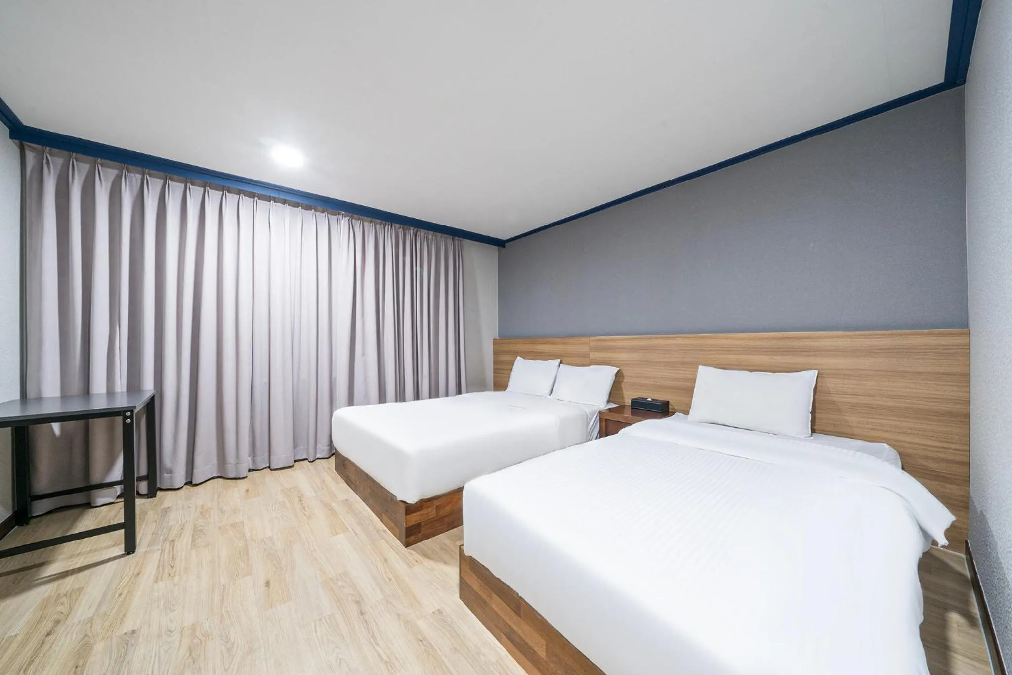 Bed in Noblesse Hotel