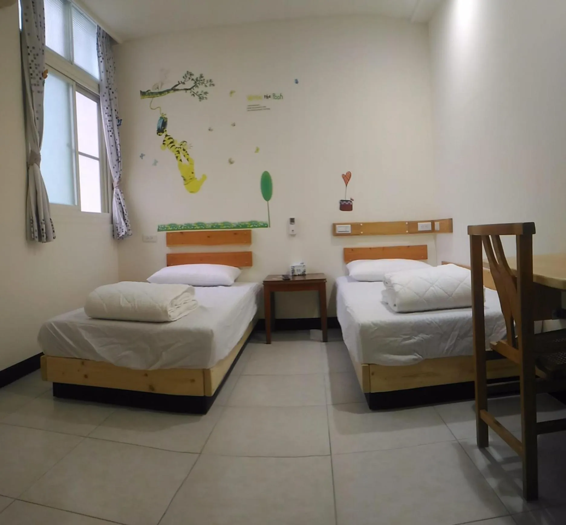 Decorative detail, Bed in Wooden Man Homestay
