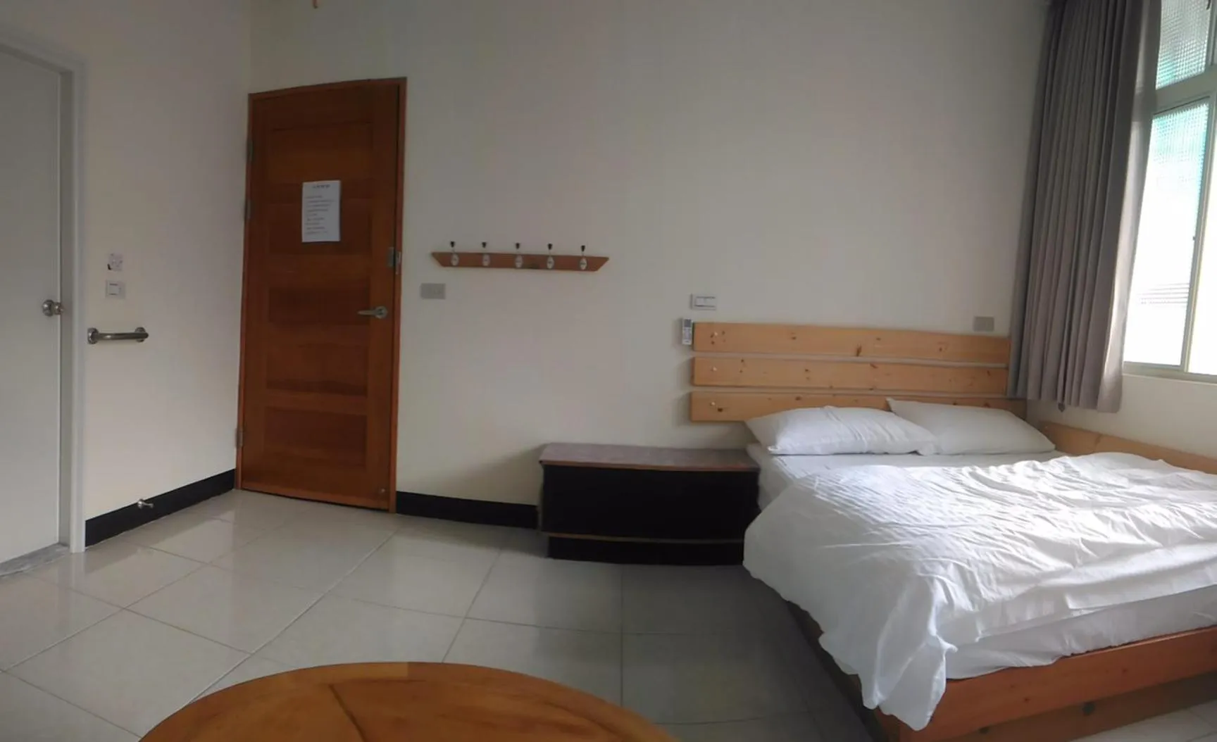 Decorative detail, Bed in Wooden Man Homestay