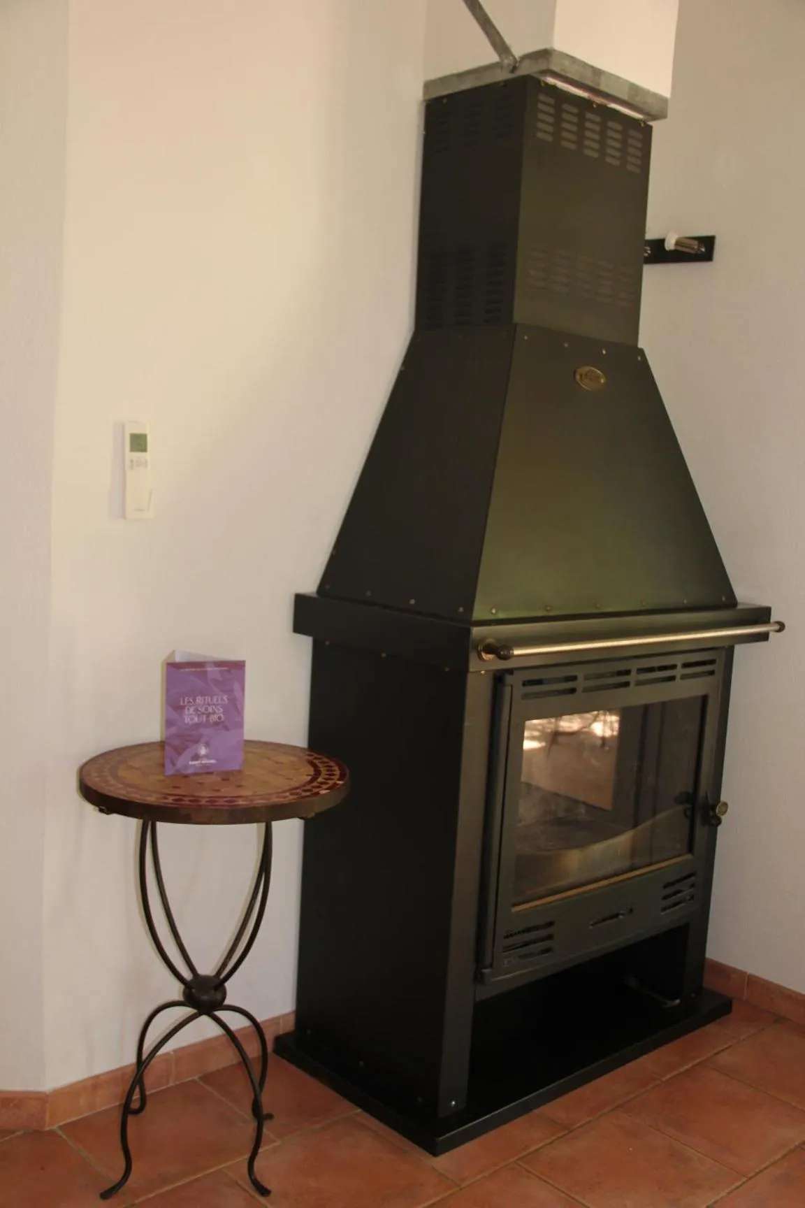 fireplace in Clos Saint-Michel Resort & Spa