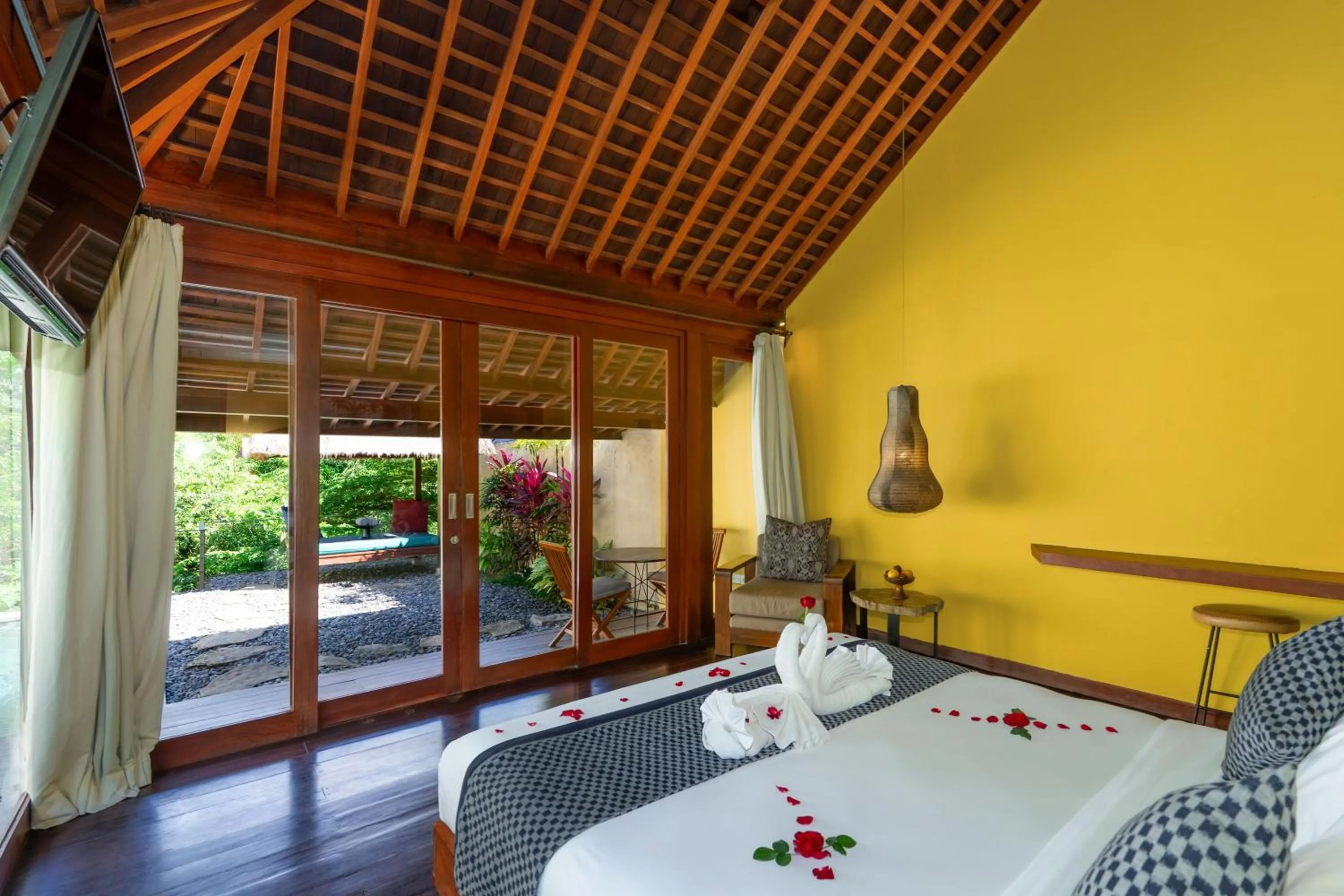 Bedroom in Temuku Ubud Villas