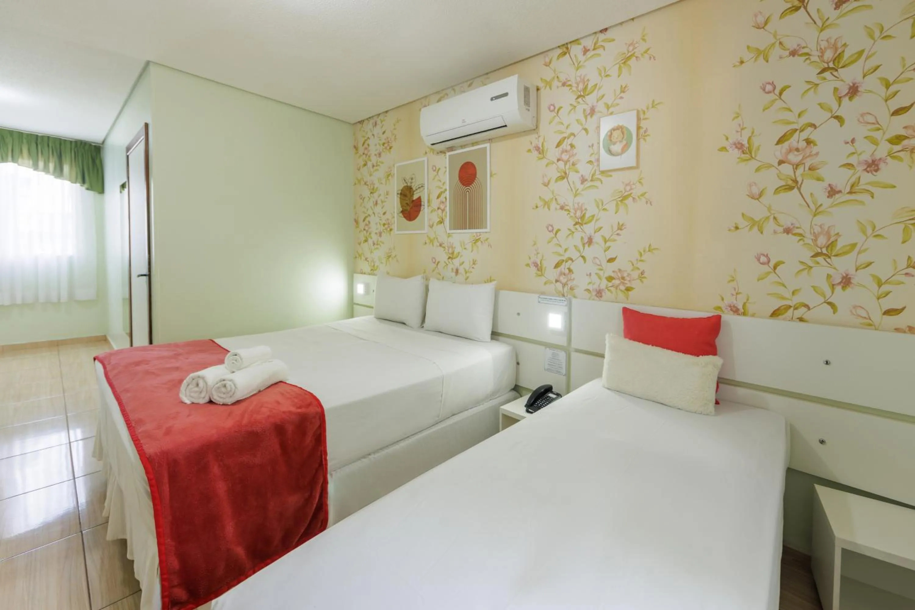 Bed in Pousada Iguassu Charm Suites