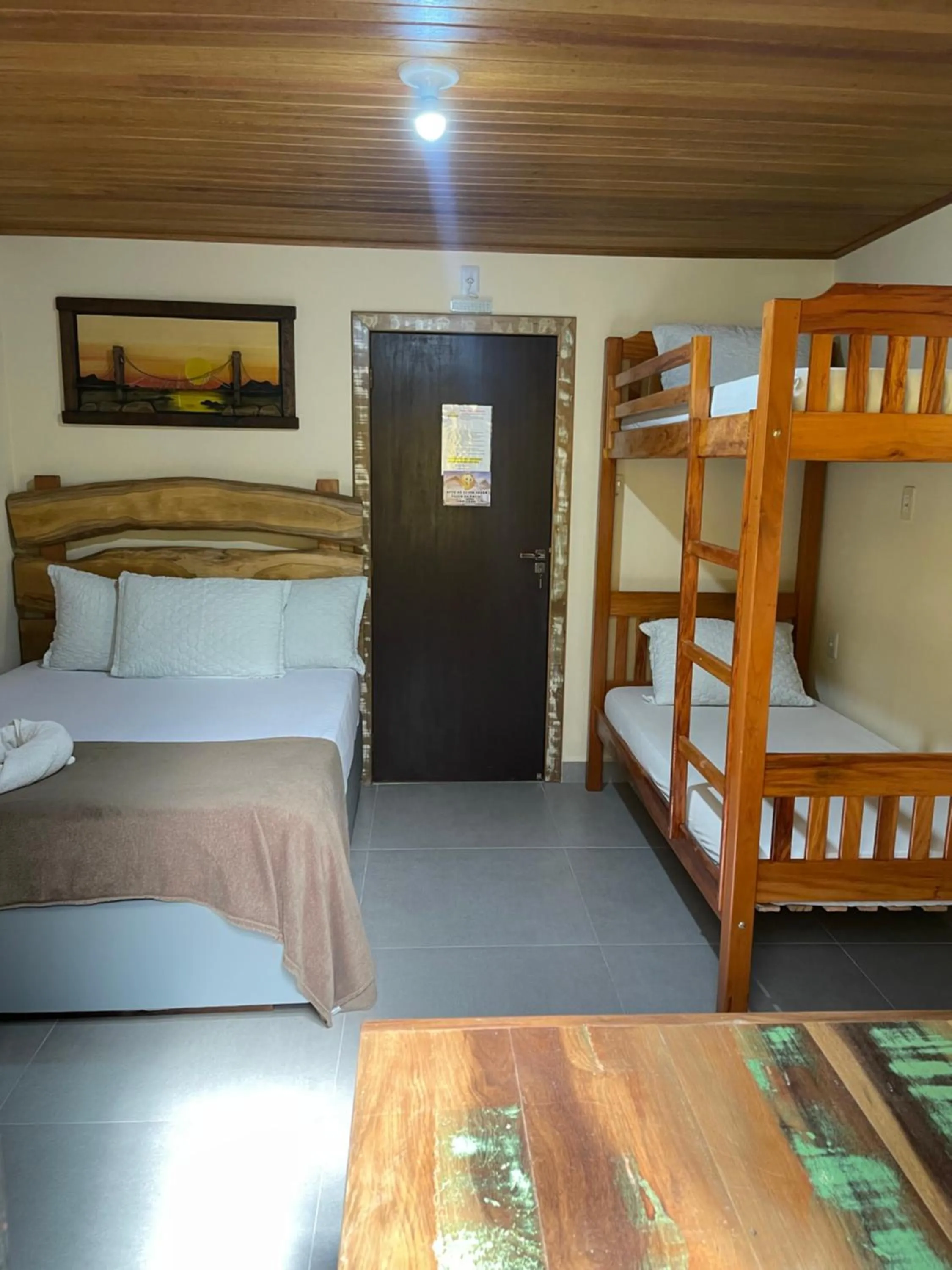 Bed in Pousada Quatro Estrelas