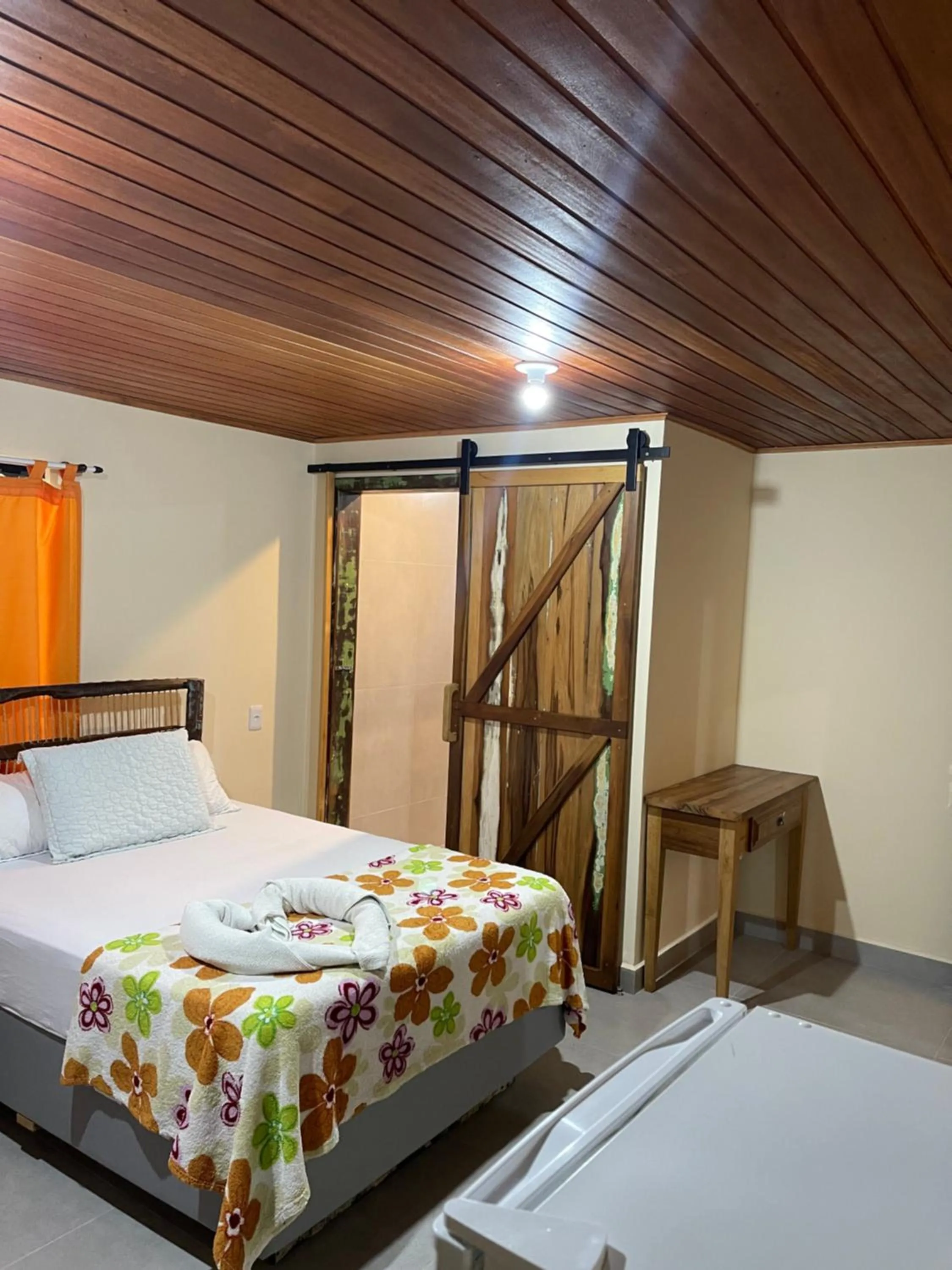 Bed in Pousada Quatro Estrelas