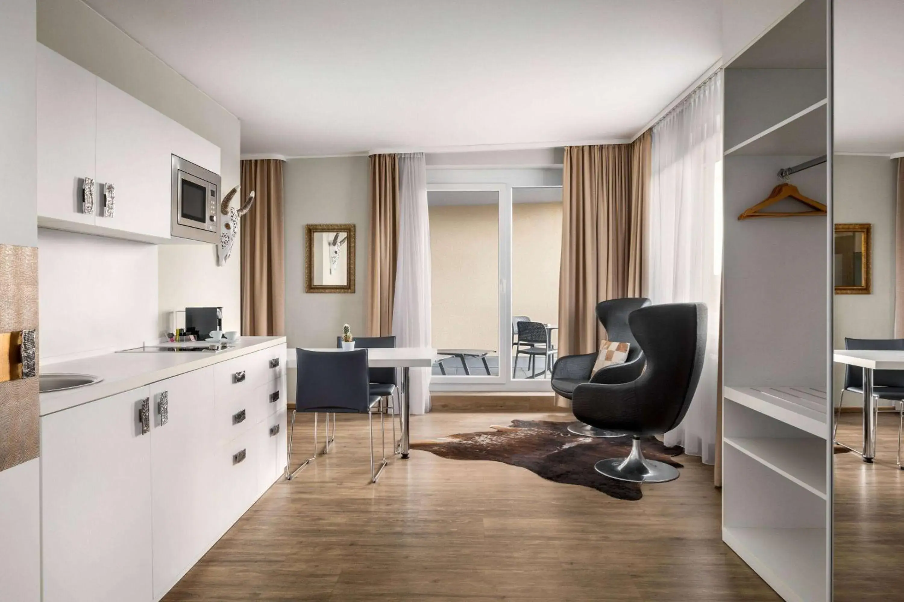 Photo of the whole room in Amedia Luxury Suites Graz, Trademark Collection by Wyndham Photo of the whole room in Amedia Luxury Suites Graz, Trademark Collection by Wyndham