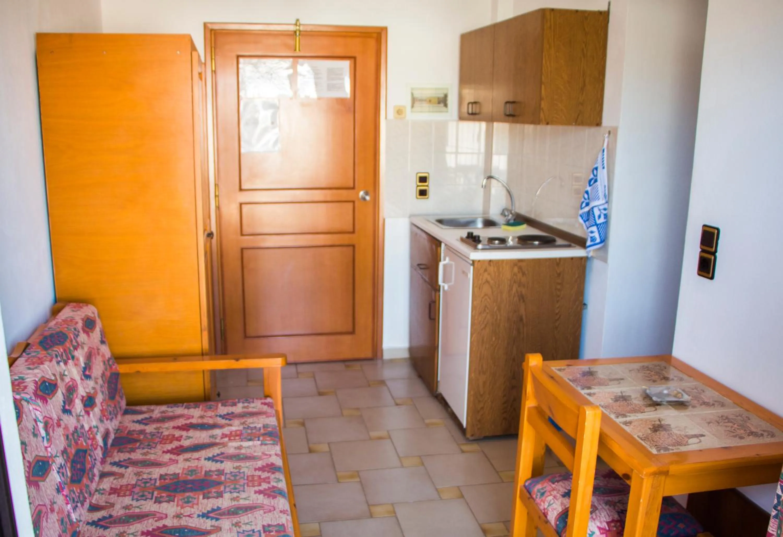 Kitchen or kitchenette in Popi Hotel Apartments