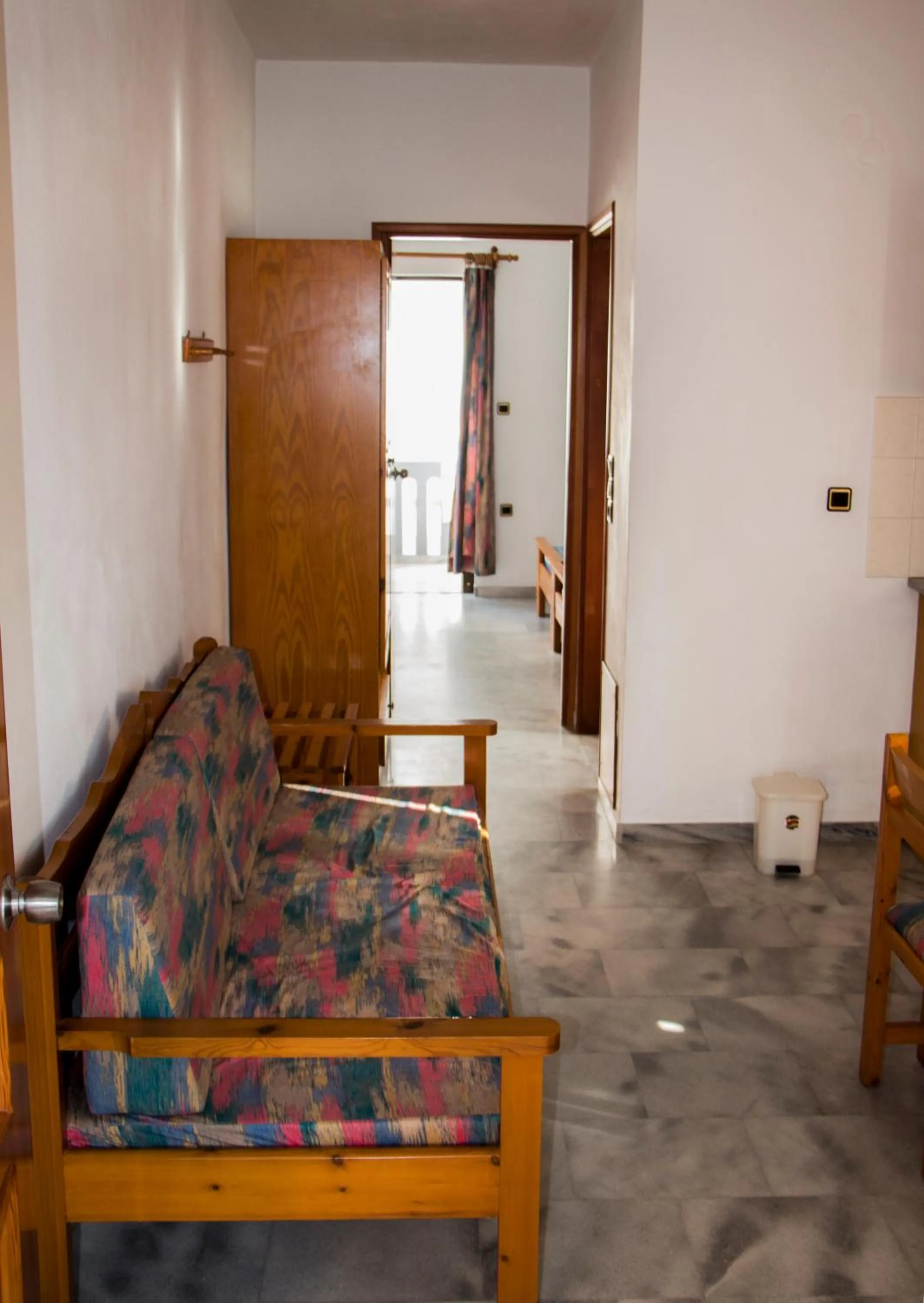 Seating area, Bed in Popi Hotel Apartments