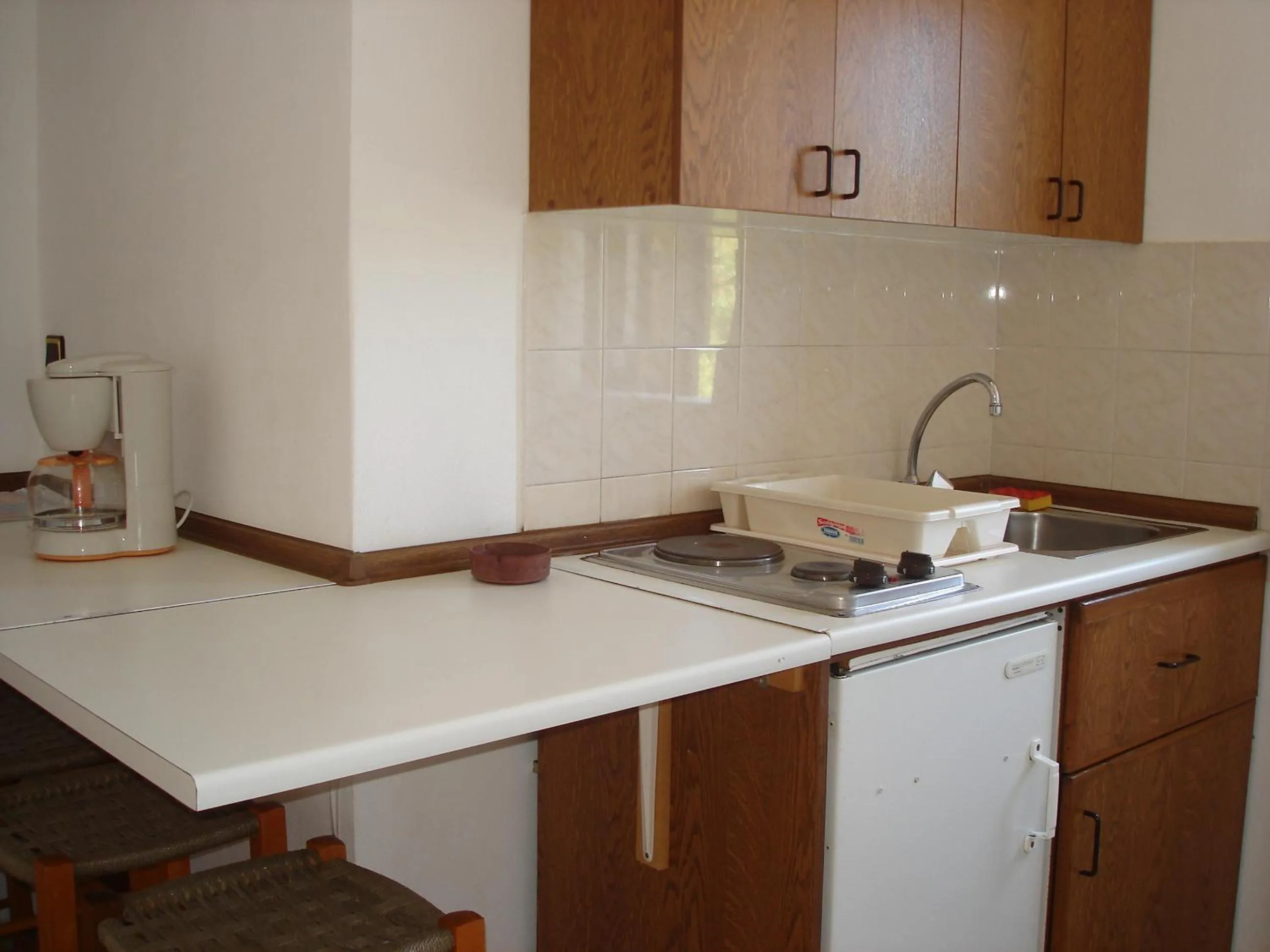 Kitchen or kitchenette in Popi Hotel Apartments
