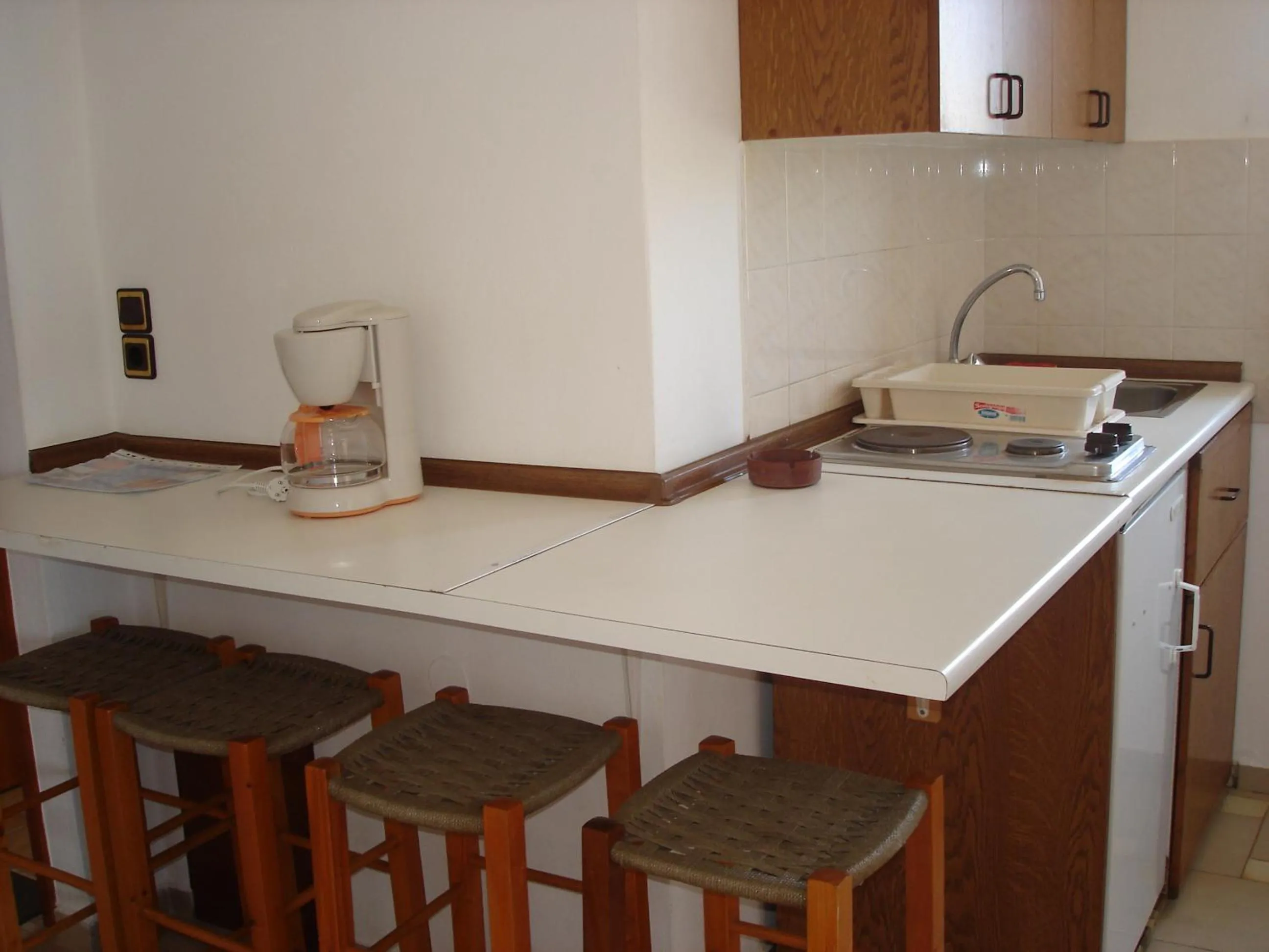 Kitchen or kitchenette in Popi Hotel Apartments