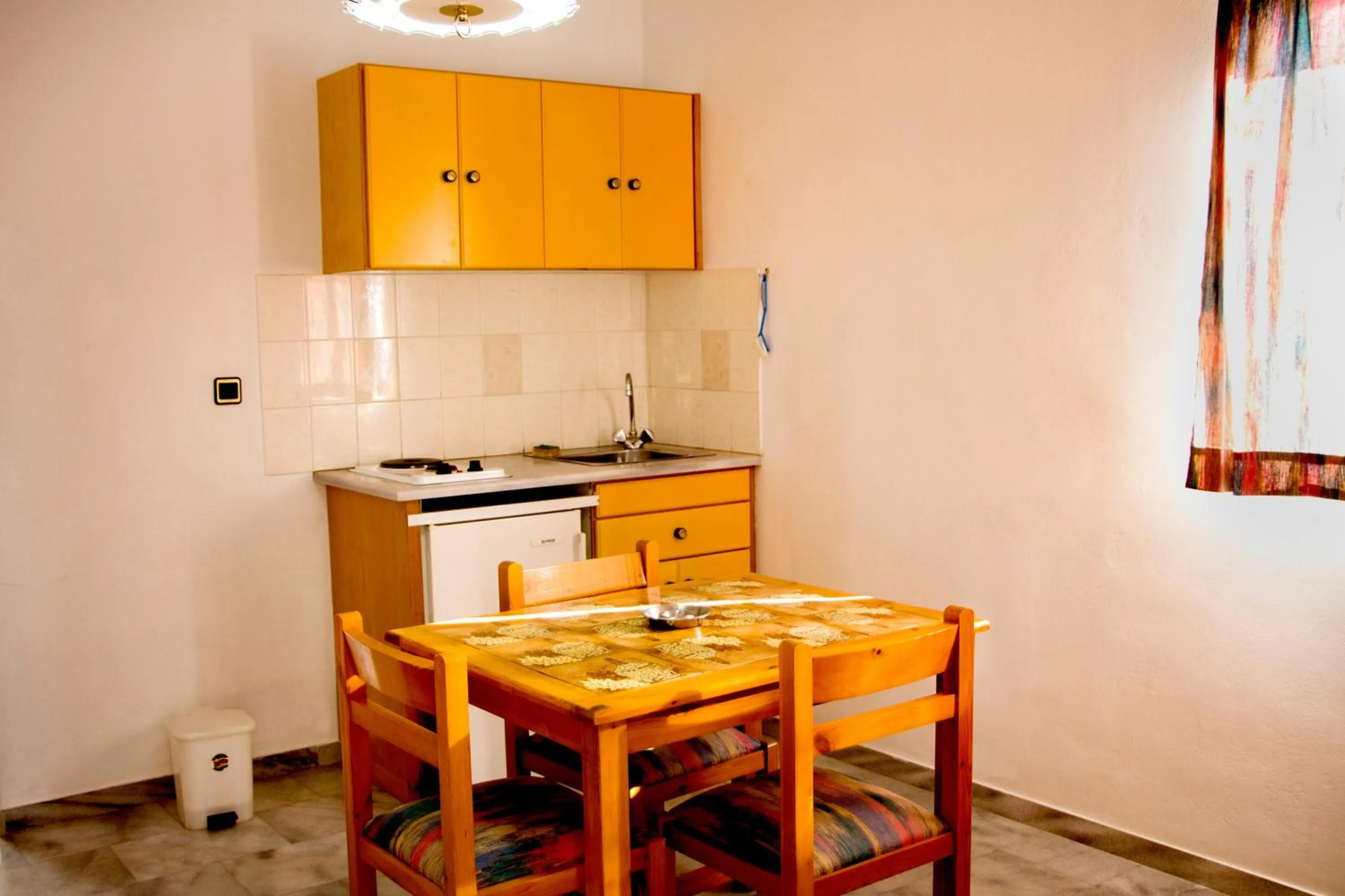 Kitchen or kitchenette in Popi Hotel Apartments