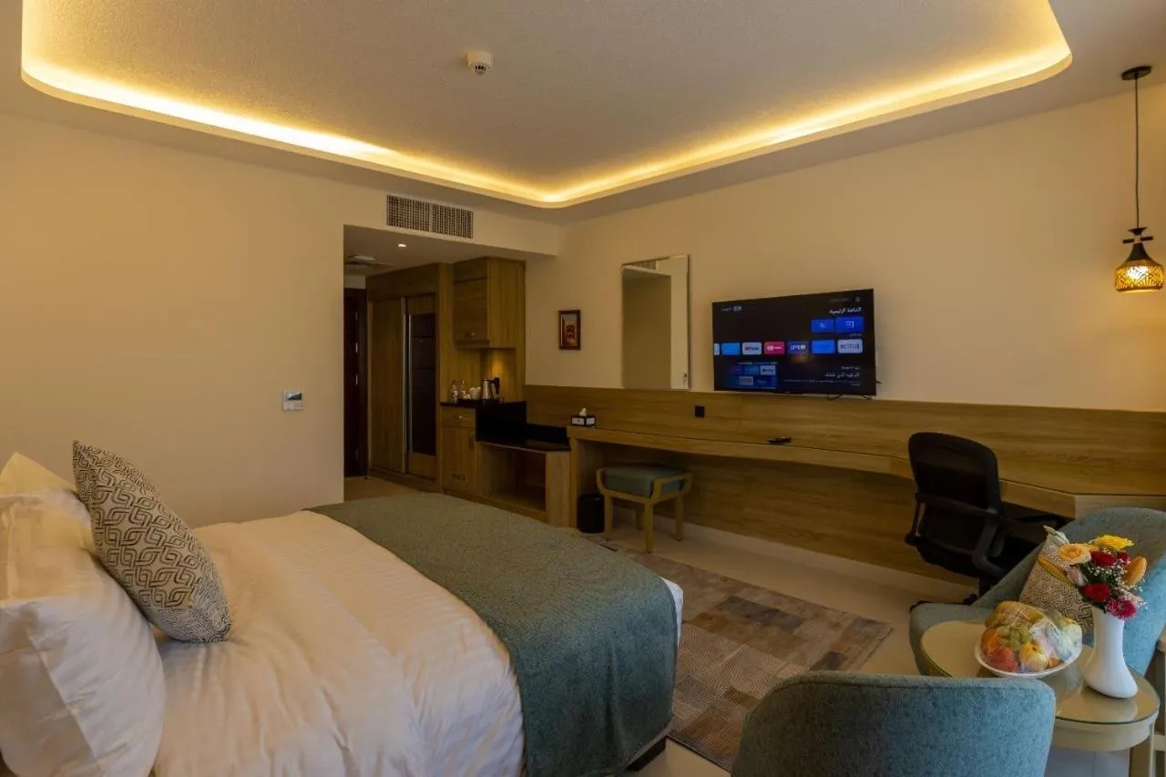 Communal lounge/ TV room, Bed in Petra Legacy Luxury