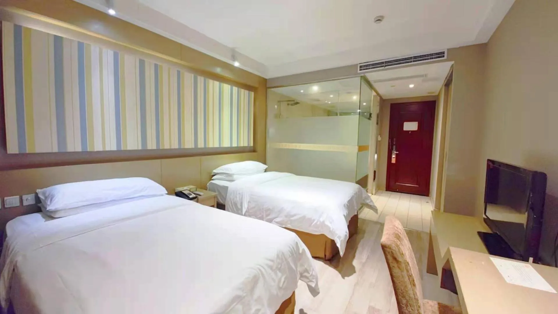 Bed in Vienna International Hotel Shanghai Hongkou Guangyue Road