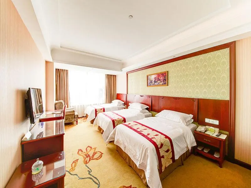 Bed in Vienna Hotel Shanghai Jiading New City