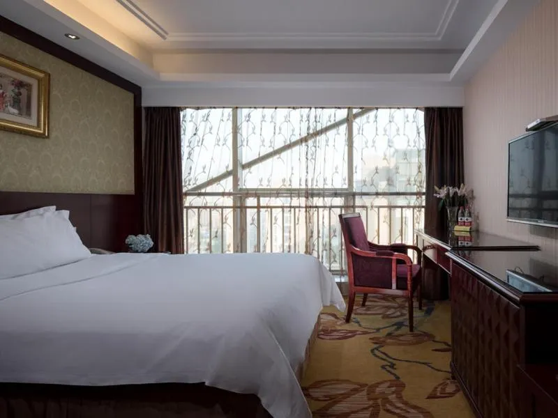 Bed in Vienna International Hotel Changzhou Hutang
