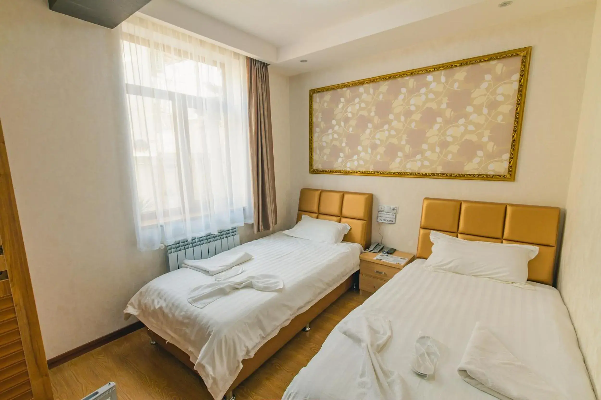 Twin Room in Hotel Garden House Twin Room in Hotel Garden House