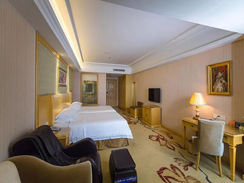 Bed in Vienna Hotel Jiangsu Xuzhou Pengcheng Square