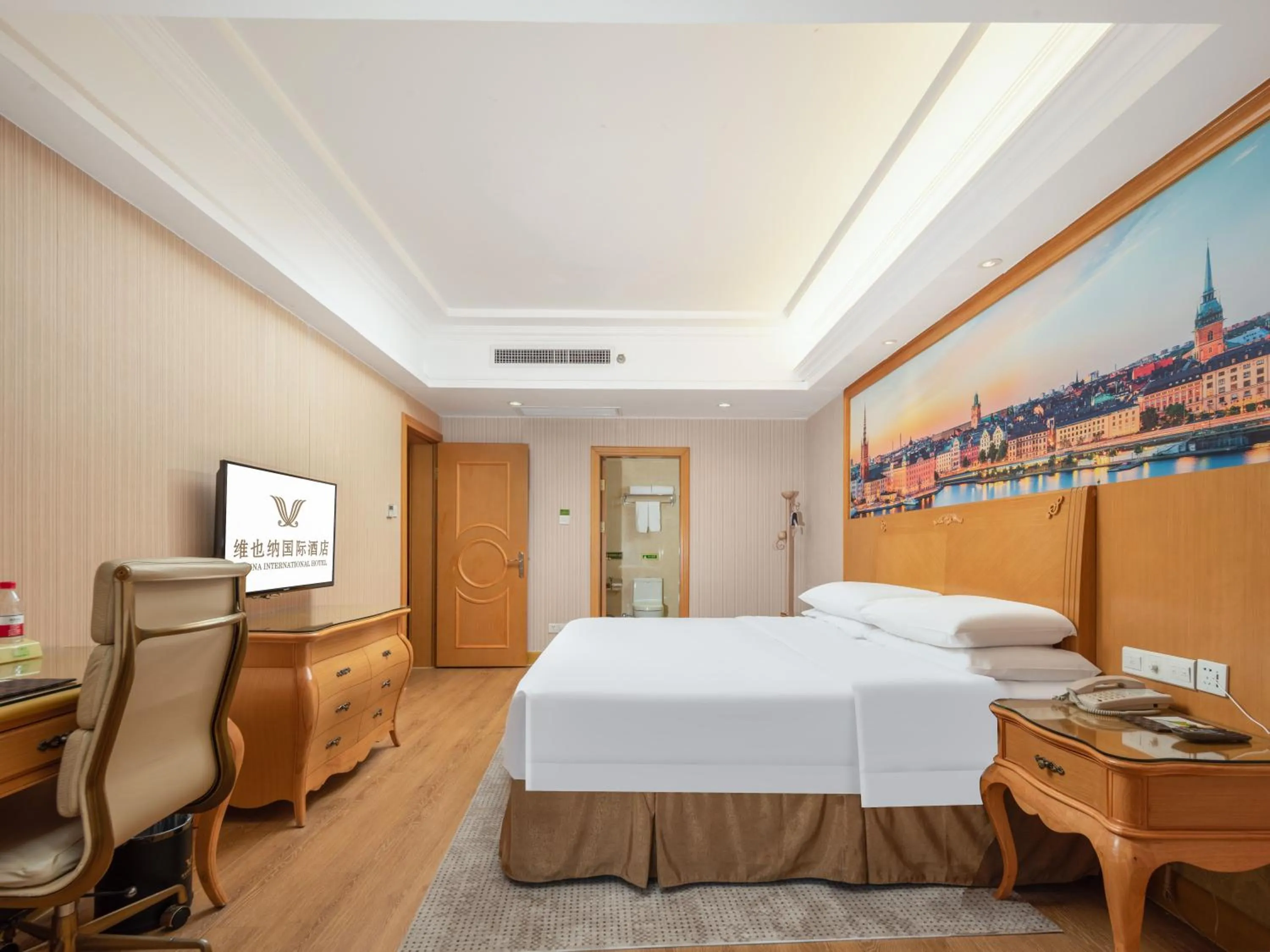 Bed in Vienna International Hotel Wuhan Jiefang Avenue
