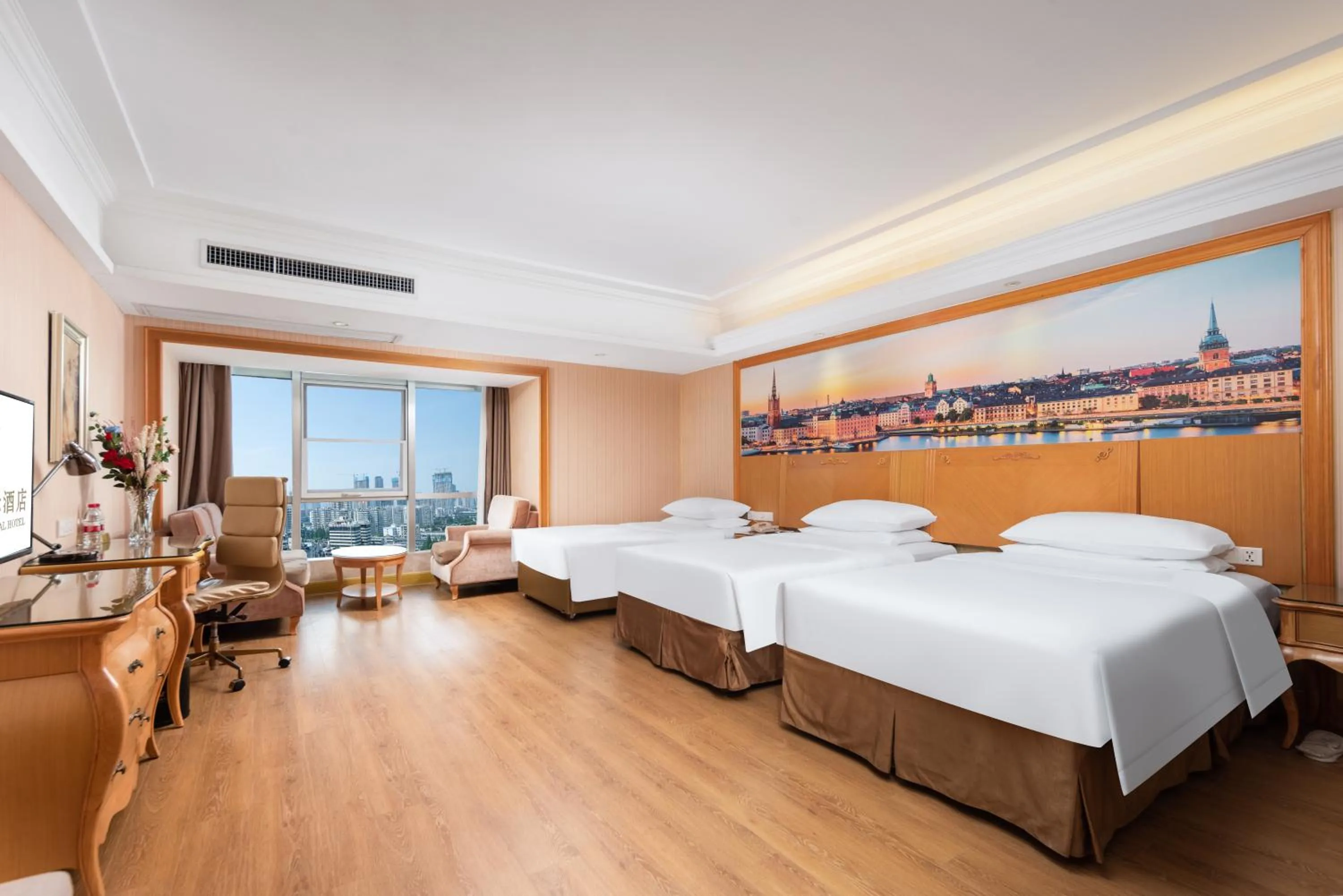 Bed in Vienna International Hotel Wuhan Jiefang Avenue