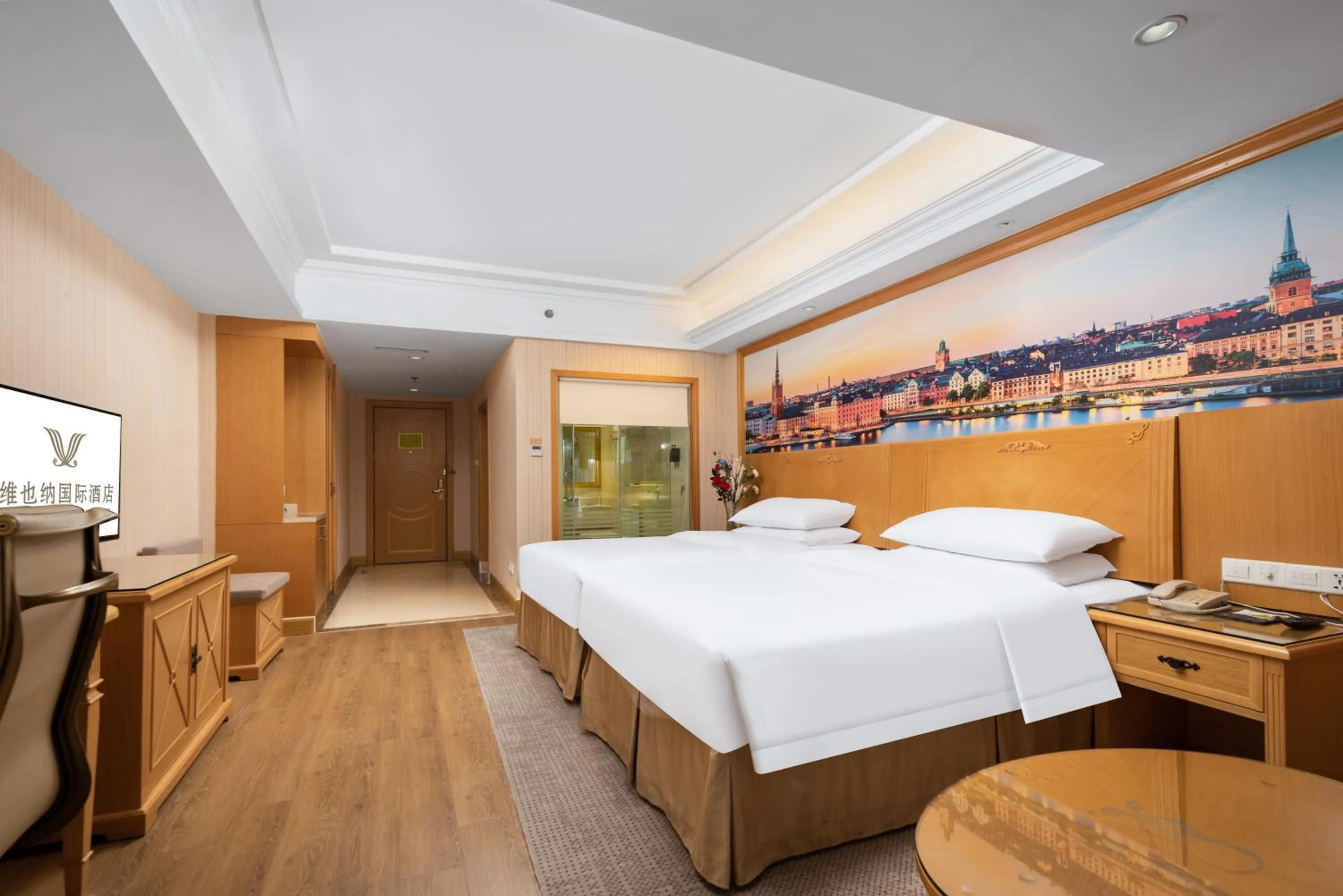 Bed in Vienna International Hotel Wuhan Jiefang Avenue