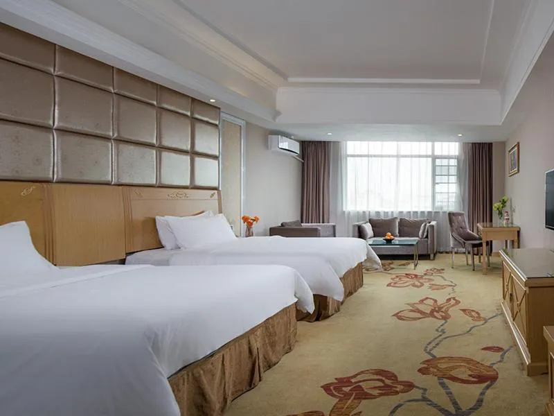 Bed in Vienna Hotel Guangzhou South Panyu Bridge