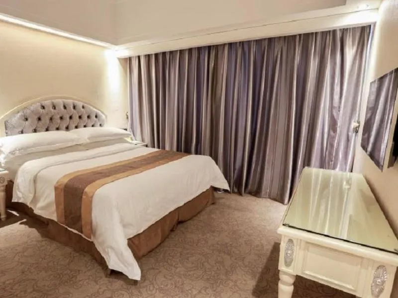 Bed in Vienna International Hotel Jieyang People's Avenue
