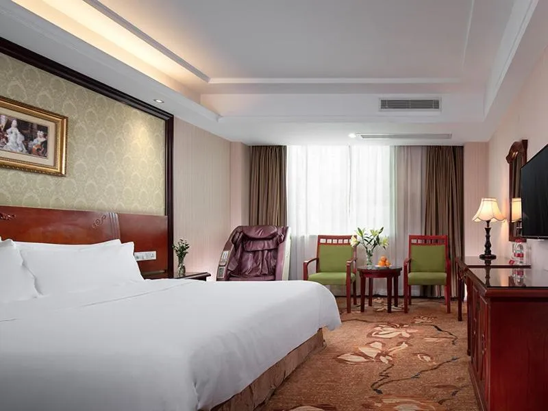 Bed in Vienna Hotel Huizhou Zhongxin