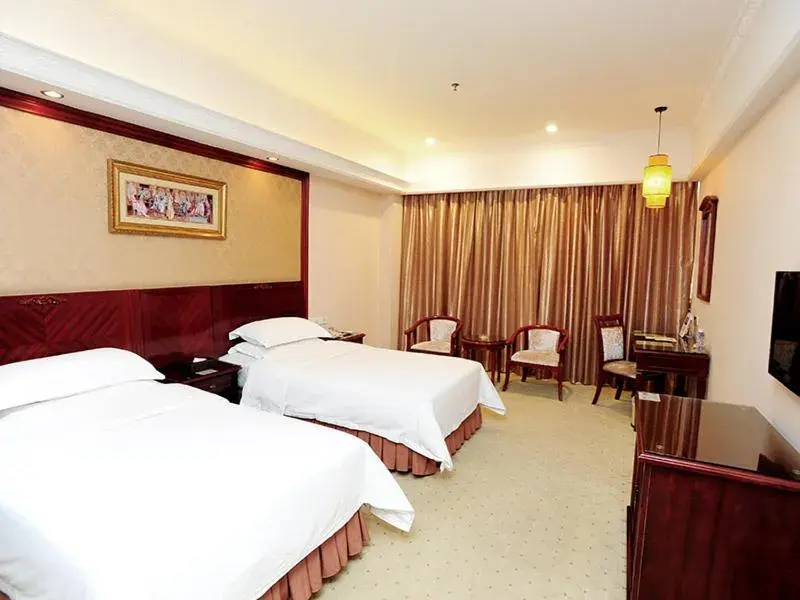 Bed in Vienna Hotel Shenzhen Longhua Qinghu Road Bed in Vienna Hotel Shenzhen Longhua Qinghu Road