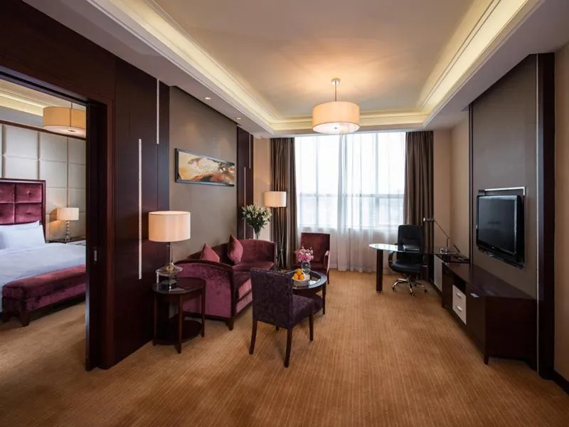 Bed in Vienna Hotel Shenzhen Exibition Center