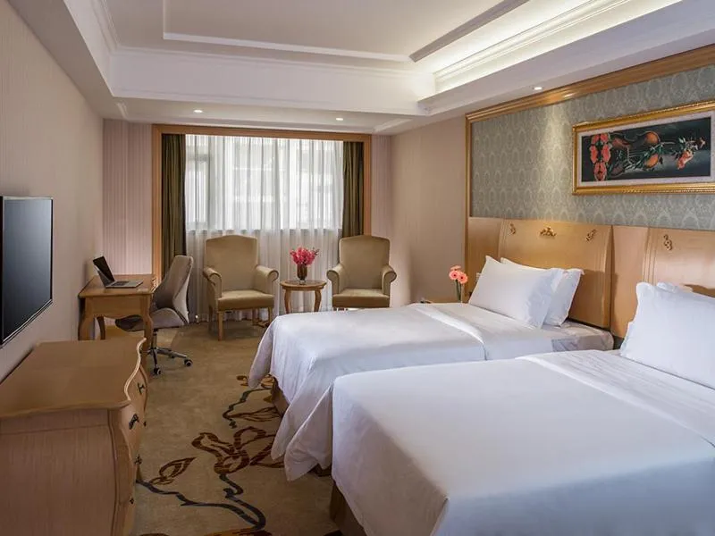 Bed in Vienna Hotel Shenzhen Nanshan Yilida