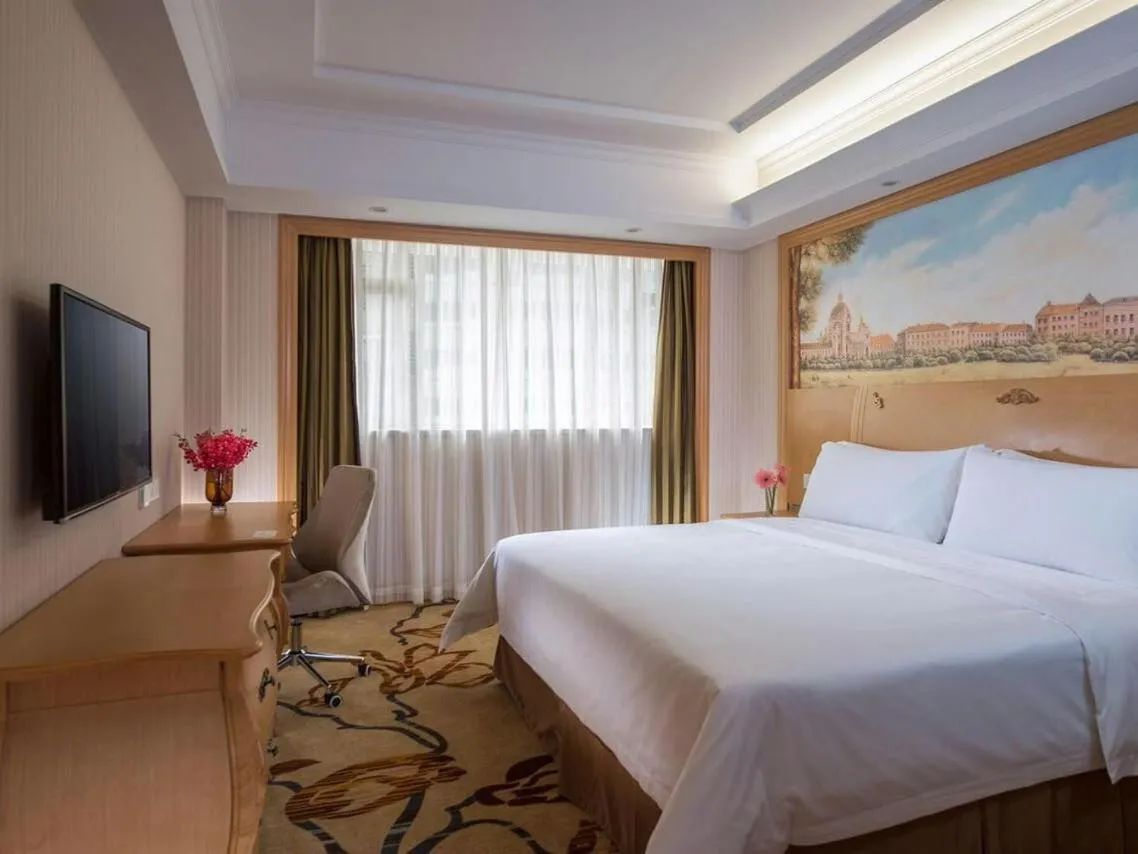 Bed in Vienna Hotel Shenzhen Nanshan Yilida