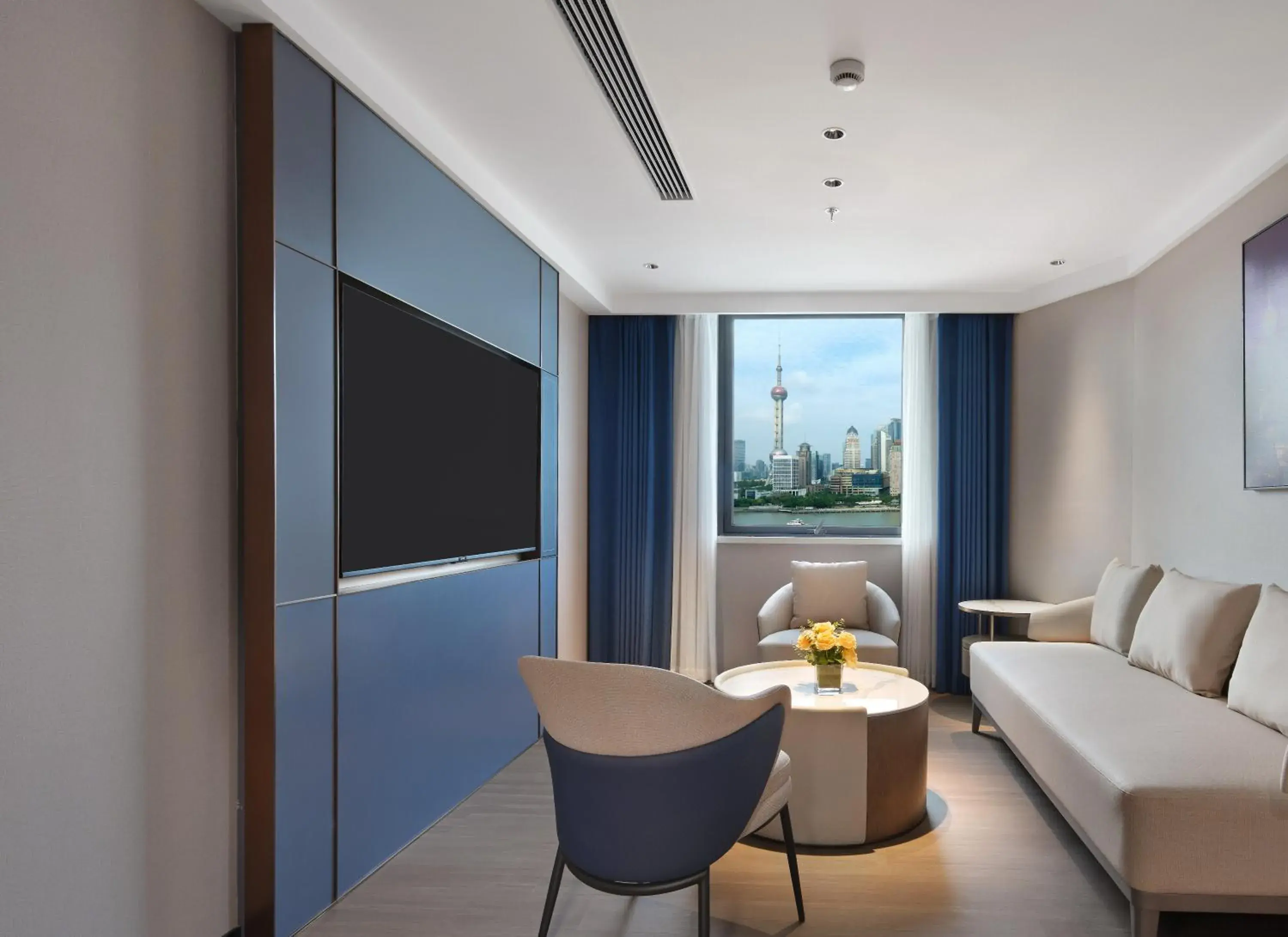 Panoramic view of the Bund, one living room, one bedroom suite in Jinglai Hotel Bushe - Shanghai Nanjing East Road Bund Branch Panoramic view of the Bund, one living room, one bedroom suite in Jinglai Hotel Bushe - Shanghai Nanjing East Road Bund Branch