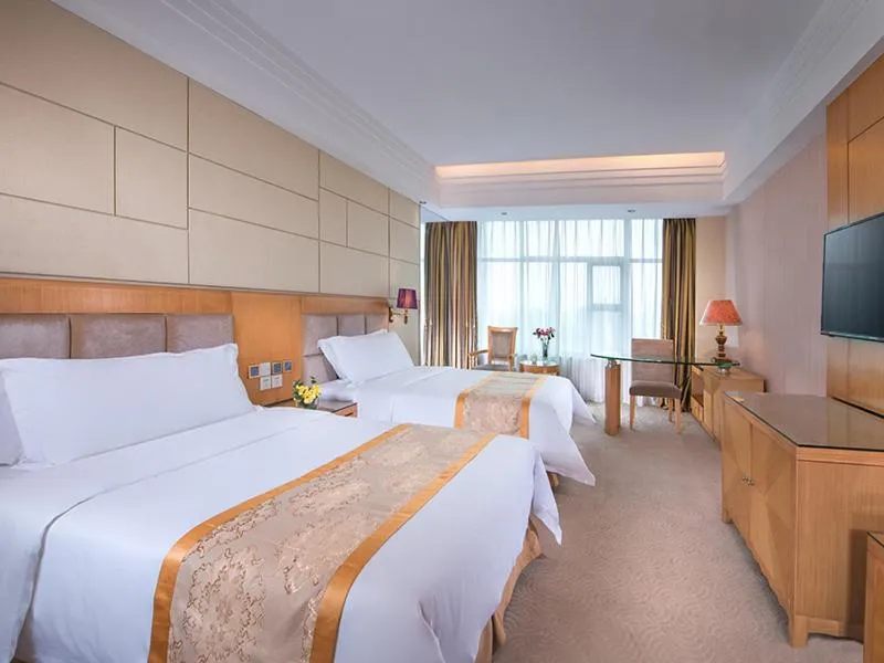 Bed in Vinenna International Hotel Shenzhen shajing