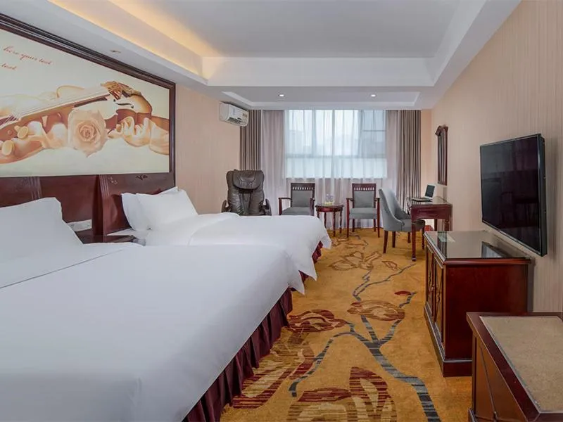 Bed in Vienna Hotel Shenzhen Shangjin Center