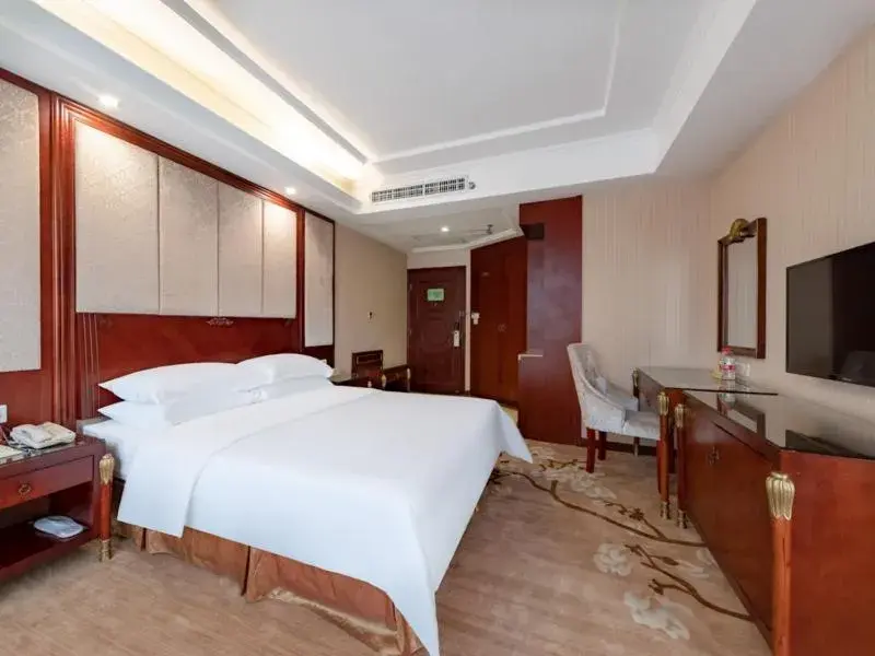 Bed in Vienna Hotel Shenzhen Songgang Shajiang Road Bed in Vienna Hotel Shenzhen Songgang Shajiang Road