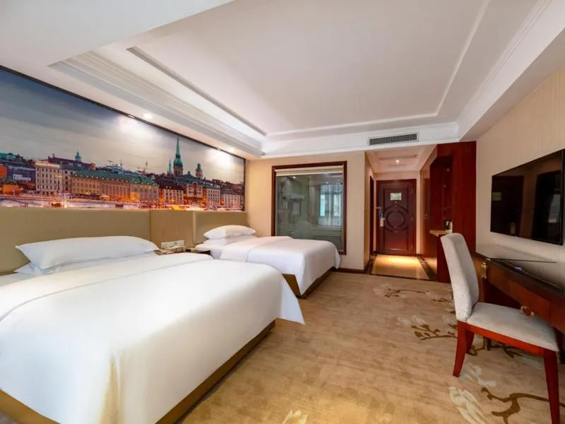Bed in Vienna Hotel Shenzhen Songgang Shajiang Road