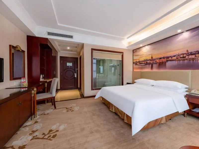 Bed in Vienna Hotel Shenzhen Songgang Shajiang Road